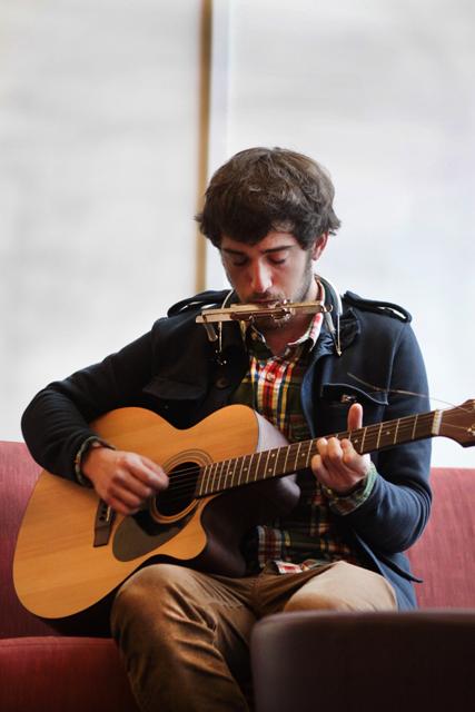 Sebastien Marsily, a senior at the SKEMA Business School, plays his guitar and harmonica during the France Cultural Showcase in Caldwell Lounge Thursday.&#160; Marsily said he likes to sing American music by artists such as john Denver, and also composes his own music.&#160; &#8220;I prefer to sing in English, I write my own songs in English because I love American music,&#8221; Marisly said.&#160;&#160;
&#160;Photo by Patrick Whaley.