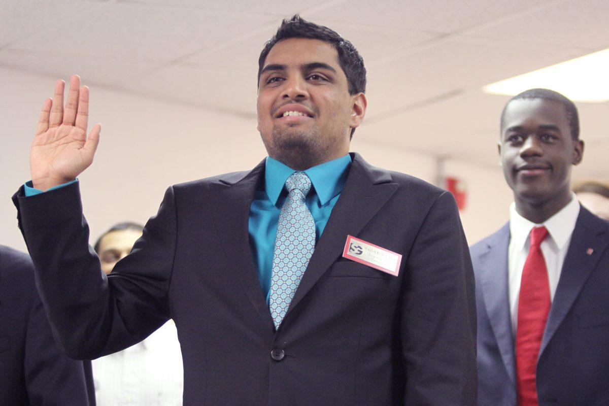 Sagar Patel, sophomore in electrical engineering takes the oath of office as a newly elected student senator. Patel was joined by the rest of the new senetors as they were sworn into office to kick off the first meeting of the 93rd Session of the Student Senate of North Carolina State University.