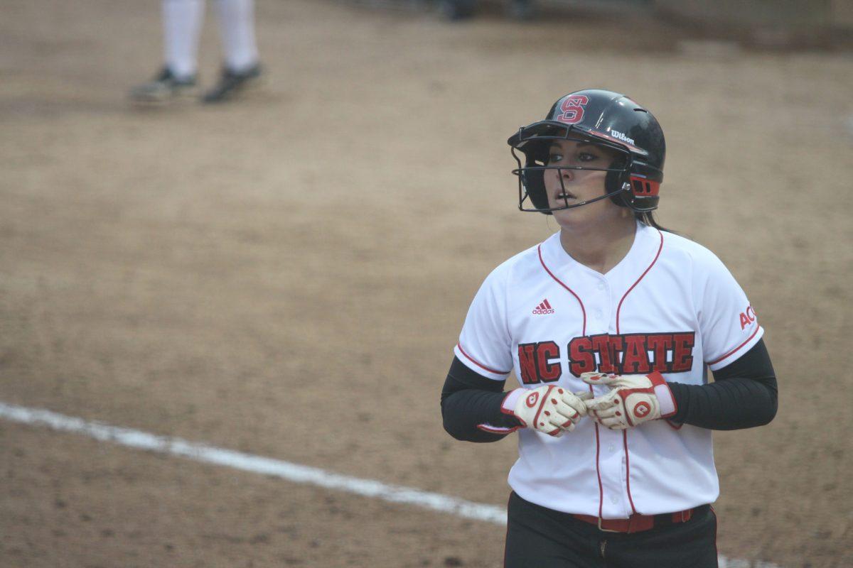 Senior outfielder Caitlin Dent reacts after hitting into a double play during the second game of a double-header against UNC Charlotte April 3, 2013. The Wolfpack defeated the 49's 2-0 in game one and 10-3 in game two taking them to 17-16-1 on the season. Photo by Caide Wooten.