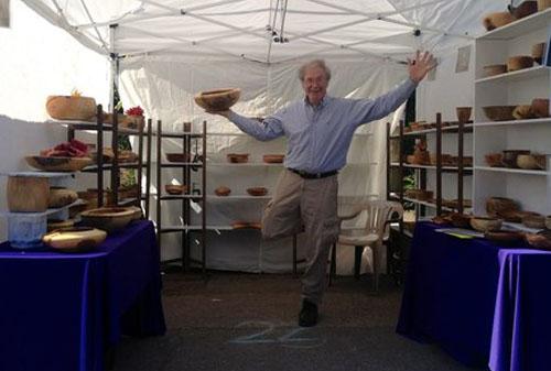 A vendor presents a bowl in his tent at Glenwood Monthly Markets on June 29. The last Monthly Market will take place on Saturday, July 27.
