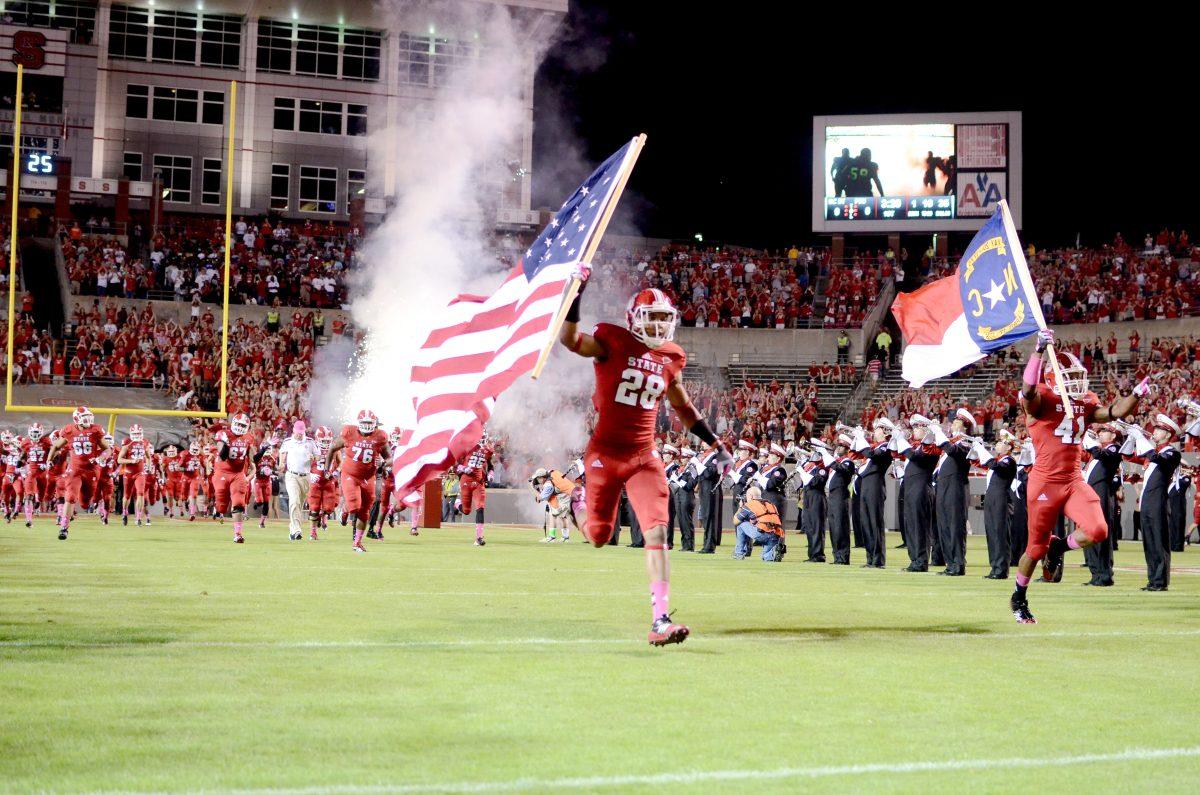 The Wolfpack football team runs out of the tunnel at Carter-Finley Stadium before their game against No. 3 ranked Florida State University. N.C. State upsetted the Seminoles 17-16 with the game winning touchdown with 16 seconds left in the game.