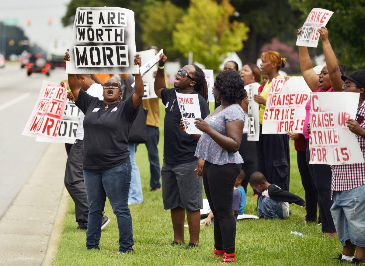 Protesters chant &#8220;Show me what democracy looks like; this is what democracy looks like,&#8221; in an attempt to earn higher wages and the ability to unionize.