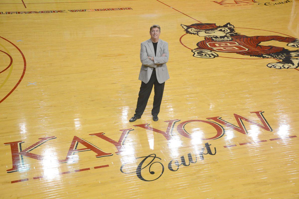 Wes Moore stands on the court at Reynolds Coliseum where he will be coaching his first games at State later this year. Wes Moore is the new women's basketball coach, replacing Kelly Harper. Moore was given a five-year contract.
