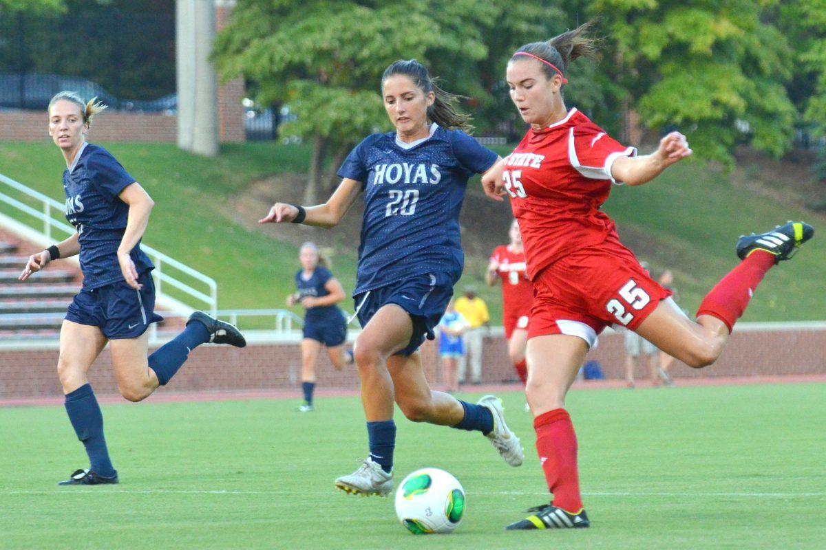 Sophomore forward Caroline Gentry takes a shot during the soccer match against Georgetown at Dail Soccer Field Wednesday Sept. 4, 2013. The Wolfpack fell to the Hoyas 2-0, their first loss of the season.