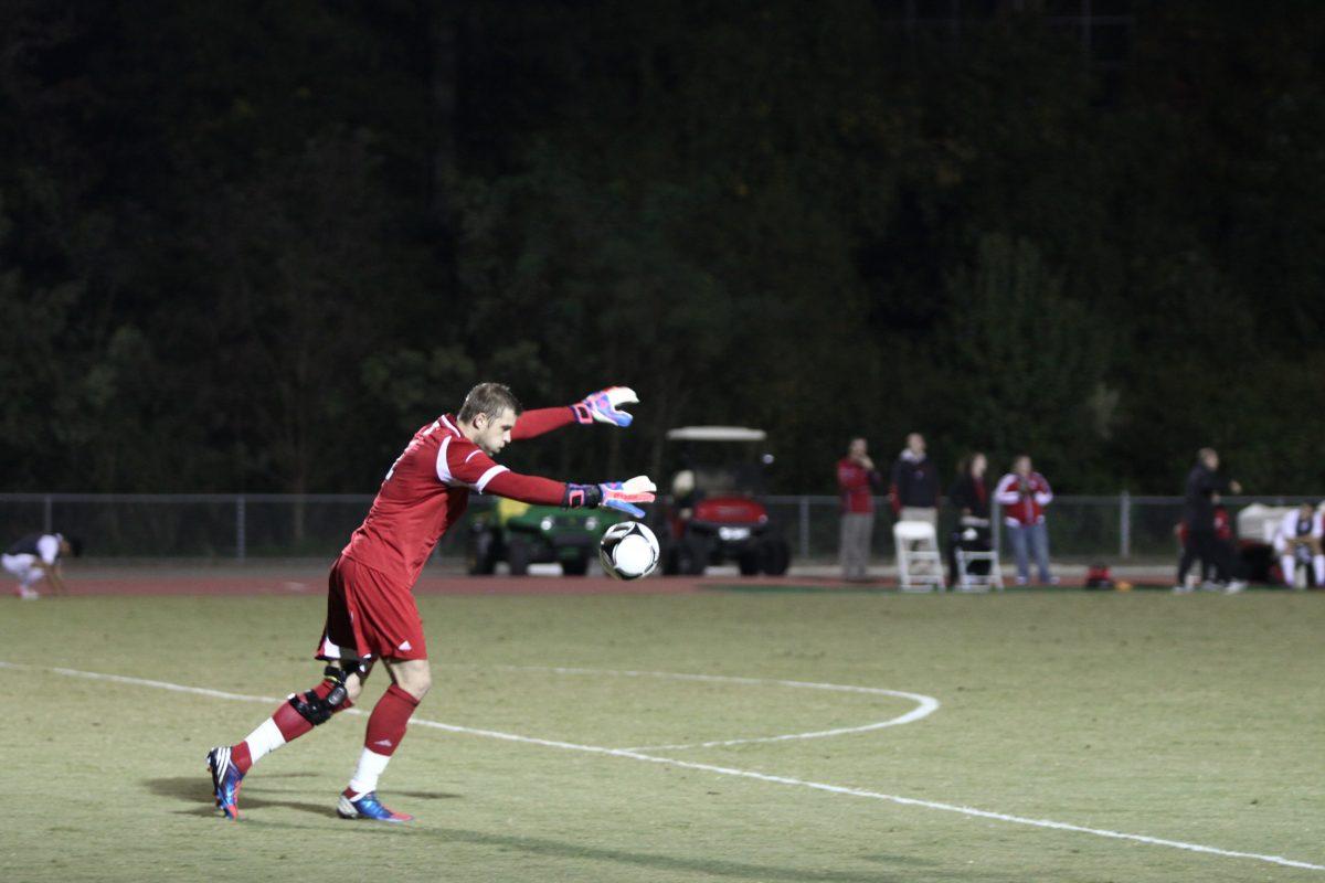 Photo by Joannah Irvin. Senior goal keeper Fabian Otte punts the ball during the Wolfpack victory over the Adelphi Panthers on Tuesday Oct 23rd. The win improved N.C. State's record to 9-7 overall and 1-5 in the ACC.