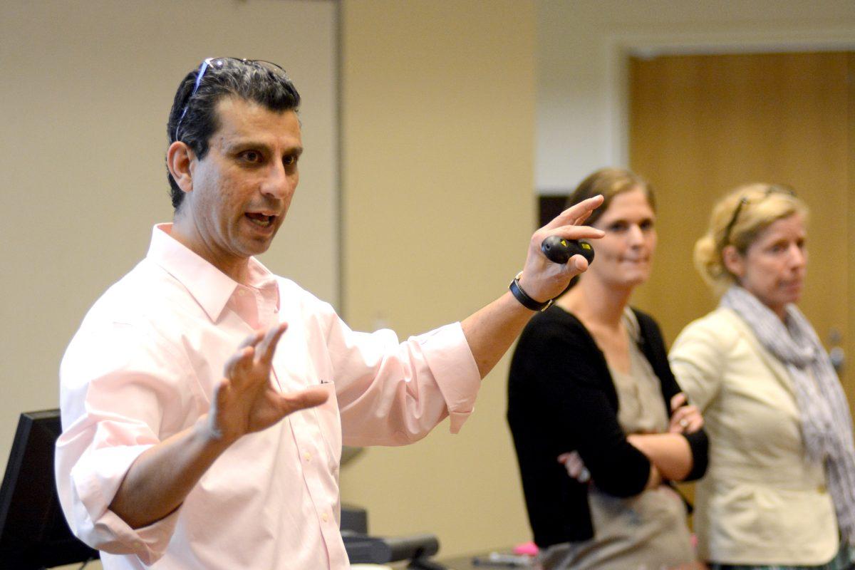Akram Khater, director of Middle East studies at N.C. State speaks to a crowd of people at the Syrian Crisis Panel Discussion in Riddick Hall Thurs., Sept. 25, 2013. The panel discussed the state of the Syrian conflict and how it effected the region. Photo by Chris Rupert