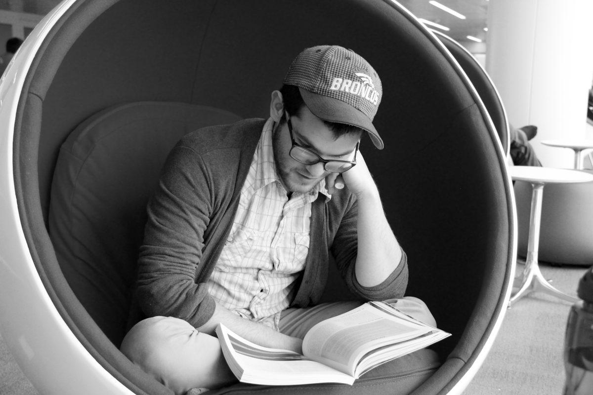 A student reads in an egg chair at Hunt Library, Jan. 27, 2013. Students come to the library to kill time, either by reading for class or by reading for fun.