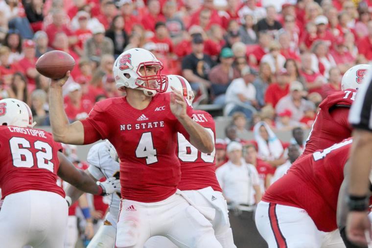 Junior quarterback Pete Thomas passes the ball in the second half against Central Michigan on Saturday, September 28 in Carter-Finley Stadium. Thomas finished the game with 244 passing yards, leading the Wolfpack to a victory over the Chippewas, 48-14. Photo by Tyler Andrews