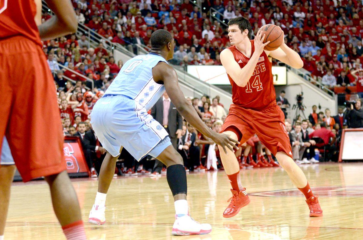 Redshirt senior Jordan Vandenberg looks to pass the ball during the basketball game against North Carolina in PNC Arena Saturday, Jan. 26, 2012. The No. 18 Wolfpack defeated the Tar Heels 91-83, their first victory in the rivalry since 2007.