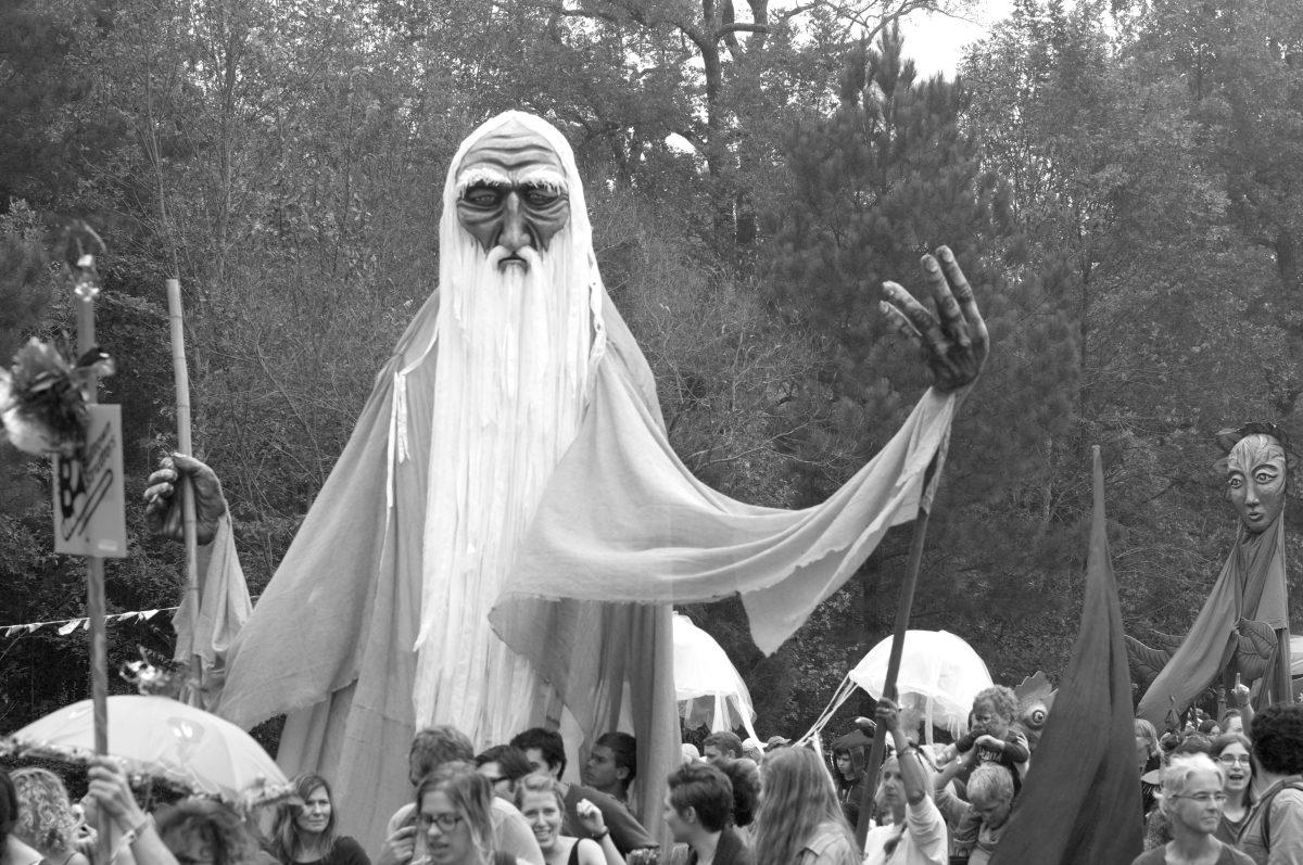 Festival attendees trekked throughout the campgrounds for the Paperhand Puppet Parade on Saturday afternoon at Shakori Hills Grassroots Festival of Music and Dance in Pittsboro, N.C.