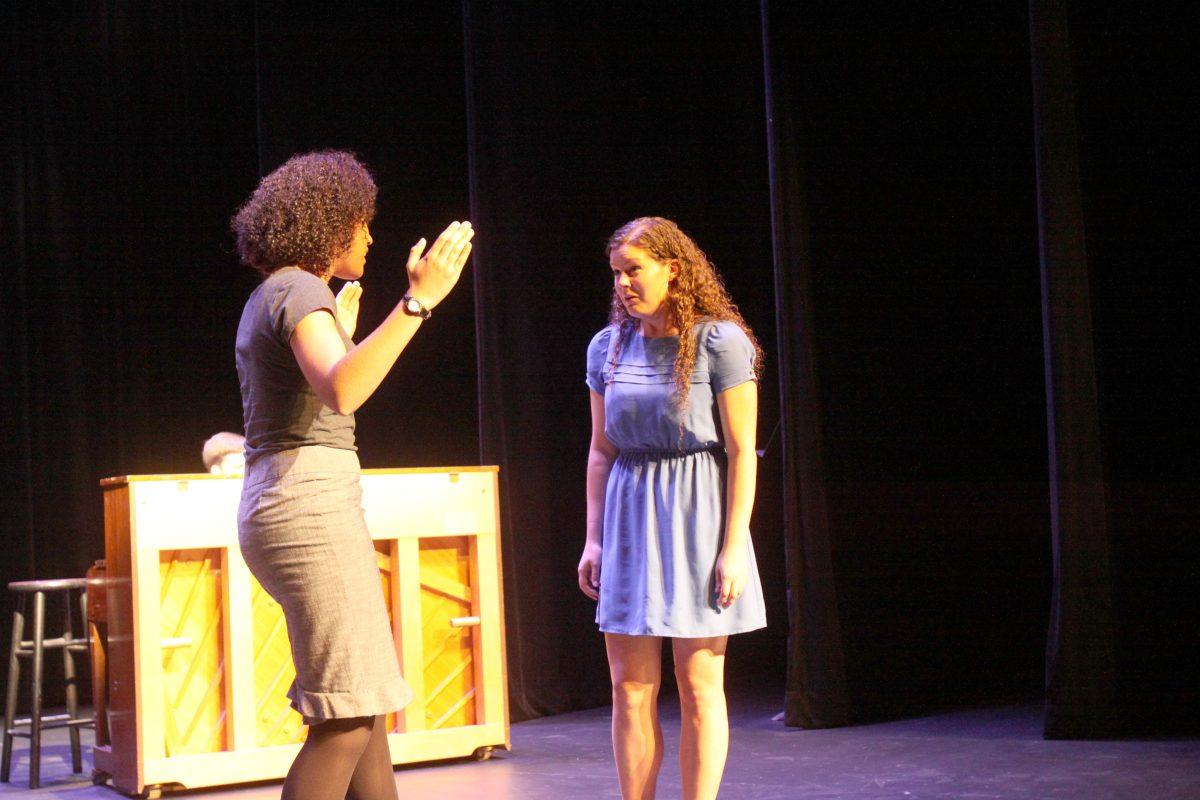 Brittney Stinnett, sophomore in business administration, and Diana Quetti, senior in communication, perform a scene from Roald Dahl's Matilda. This performance was a part of Banned Books Week which occured in Thompson Hall on Tuesday, September 24, 2013.