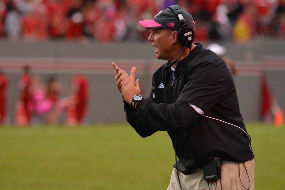 Head coach Dave Doeren talks to his team during the football game against new ACC member Syracuse in Carter-Finley Stadium Saturday, Oct. 11, 2013. The Orange defeated the Wolfpack 24-10, dropping N.C. State to 0-3 in conference play. Photo by John Joyner.