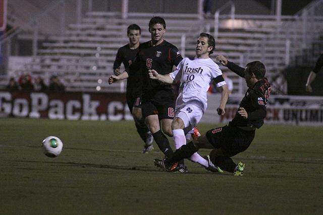Senior defender Ryan Metts and freshman midfielder Michael Bajza pressure the Notre Dame player. The Wolfpack fell to the Fighting Irish 2-1 on Saturday, Oct. 19, 2013. The Wolfpack will host Liberty University at Dail Soccer Stadium on Tuesday, Oct. 22, 2013.