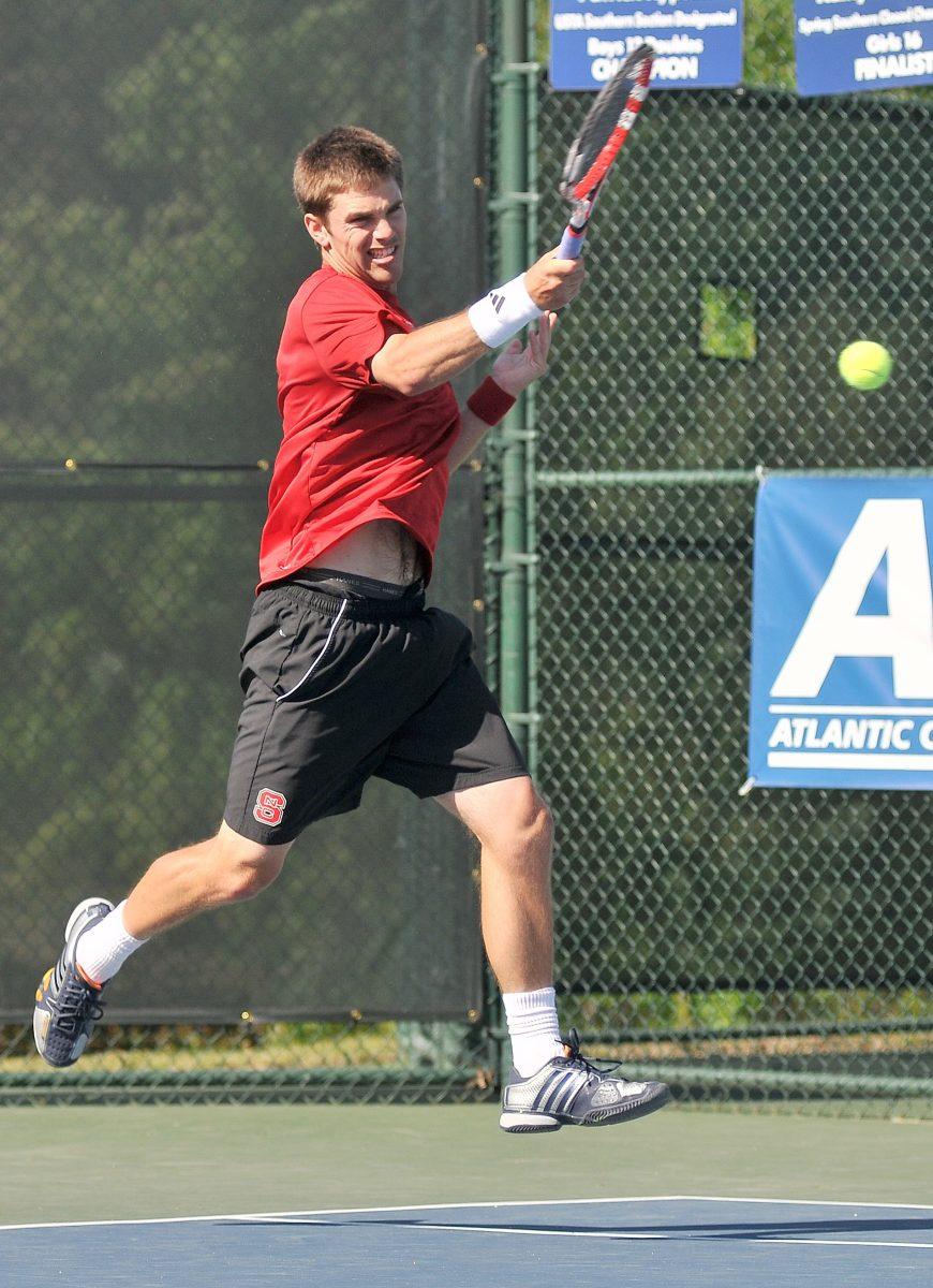 Junior Austin Powell returns the ball against Clemson Friday, April 26, 2013. The Wolfpack fell to the Tigers 4-2 during round two of the ACC Tournament at Cary Tennis Park.
