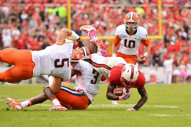 Sophomore running back Shadrach Thornton runs the ball during the football game against new ACC member Syracuse in Carter-Finley Stadium Saturday, Oct. 11, 2013. The Orange defeated the Wolfpack 24-10, dropping N.C. State to 0-3 in conference play.