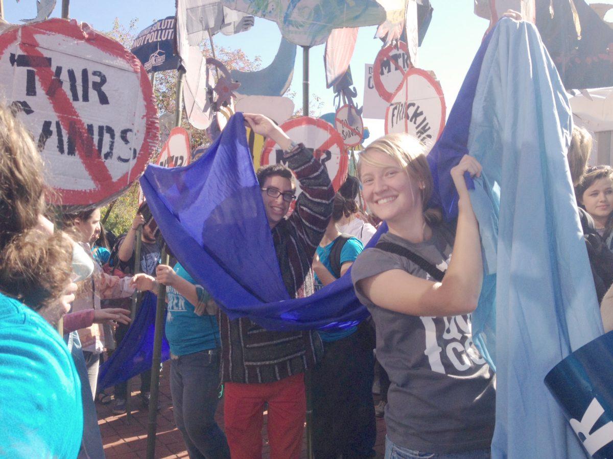 Jason Hull, a senior in agriculture business management, and Jaclyn Mills, a junior in plant and soil science, walked the streets of downtown Pittsburgh, Monday to protest dirty energy practices. The protest ended the 2013 Power Shift conference, which included presentations, panels and concerts. Twenty-four students from N.C. State attended this year.&#160;