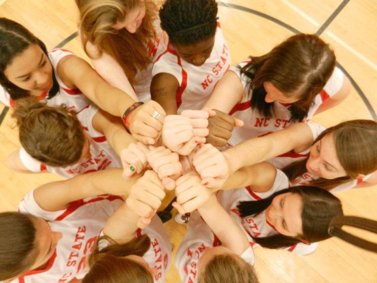 The N.C. State women&#8217;s basketball club team meets at center court prior to the start of a game. The team finished its season on Nov. 10, with a quarterfinal finish in the East Coast Basketball Regional Tournament.