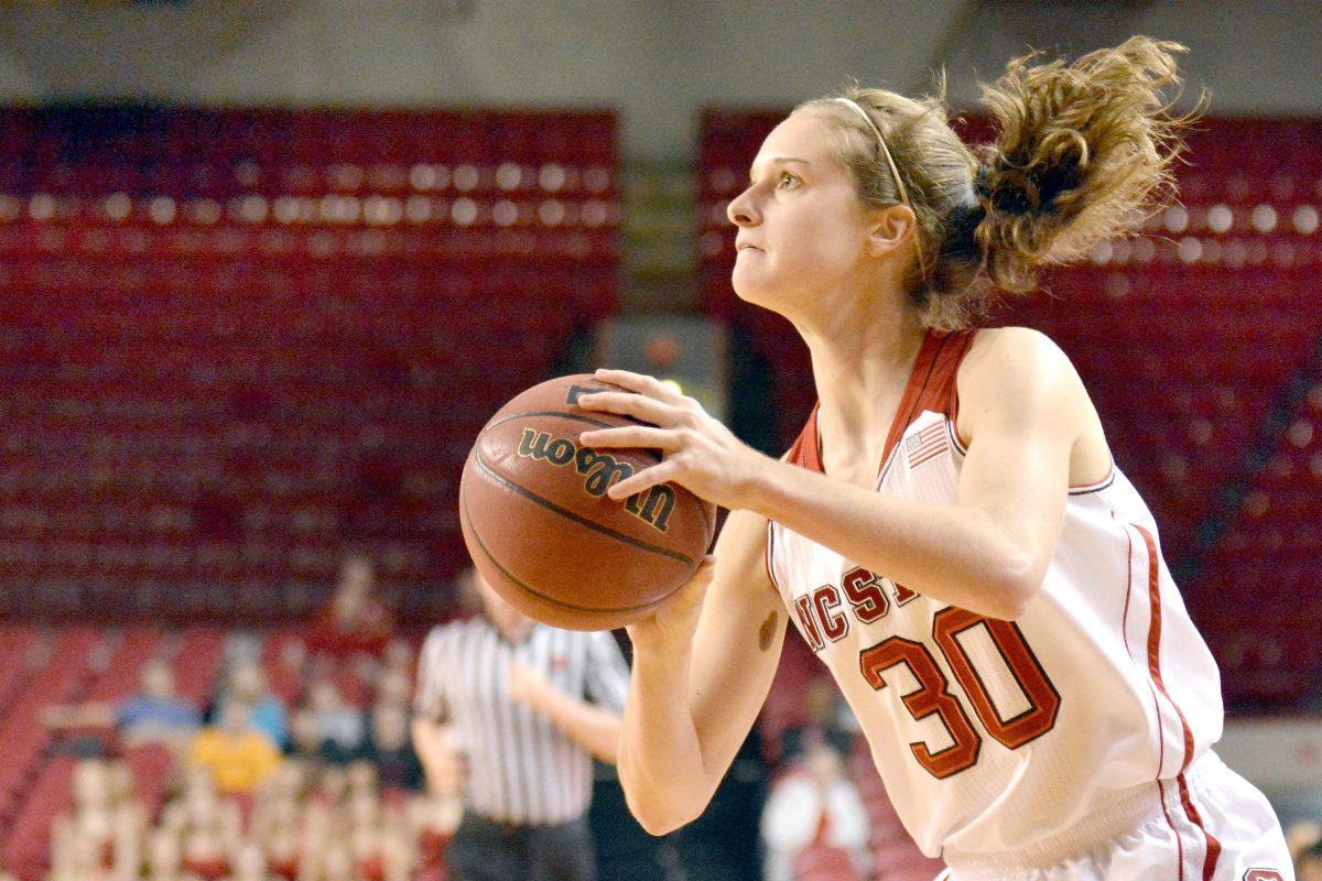 Sophomore guard Kaley Moser attempts a three point shot during the game against Morgan State in Reynolds Coliseum on Monday, Nov. 18, 2013. The Wolfpack defeated the Bears, 94-52.