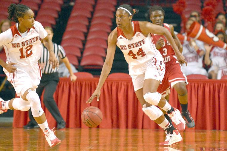 Senior forward Kody Burke drives down the court during the exhibition game against the Winston-Salem State in Reynolds Coliseum Sunday, Nov. 3, 2013. The Wolfpack defeated the Rams 80-46.