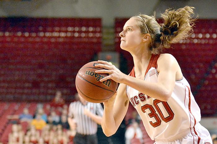 Sophomore guard Kaley Moser attempts a three point shot during the game against Morgan State in Reynolds Coliseum on Monday, Nov. 18, 2013. The Wolfpack defeated the Bears, 94-52.