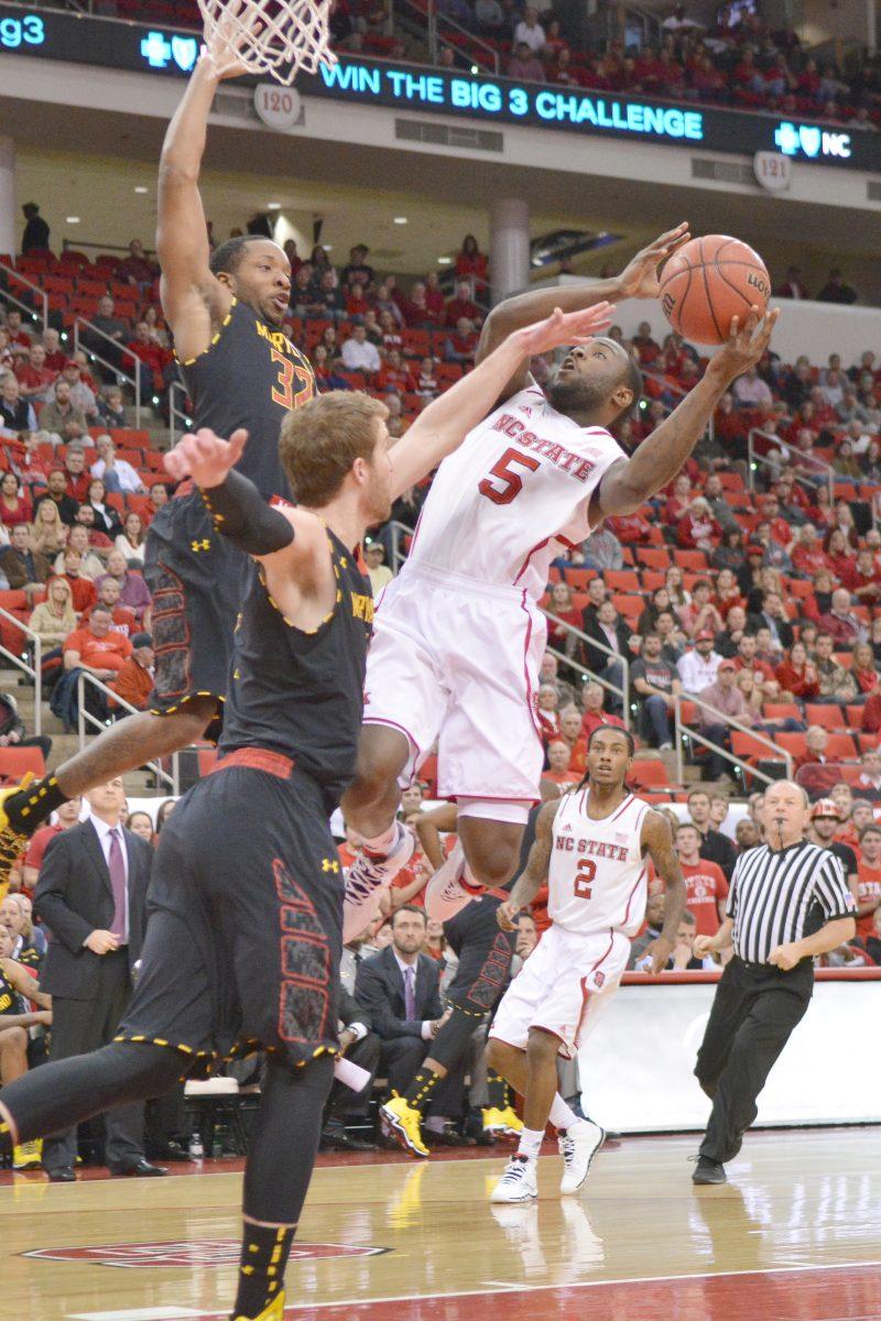 Junior guard Desmond Lee takes a contested shot during the game against Maryland in PNC Arena on Monday, Jan. 20, 2013. Photo by John Joyner.