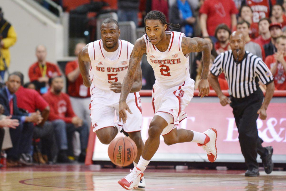 Freshman guard Anthony &#8216;Cat&#8217; Barber makes a break down the court during the game against Pitt in PNC Arena Saturday, Jan. 4, 2014. Barber went 2-10 from the floor in the Wolfpack&#8217;s 74-62 loss to the Panthers. Photo by John Joyner.
