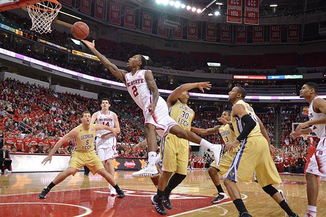 Freshman guard Anthony &#8216;Cat&#8217; Barber takes a shot during the game against Georgia Tech in PNC Arena Sunday, Jan. 26, 2014. Barber led the ten with five assists in the Wolfpack&#8217;s 80-78 overtime victory over the Yellow Jackets. Photo by John Joyner.
