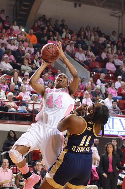 Junior forward Kody Burke takes a jump shot during the eighth annual Hoops 4 Hope basketball game against Georgia Tech in Reynolds Coliseum on Feb. 17, 2013. The Wolfpack women fell, 79-70, to the Yellow Jackets.