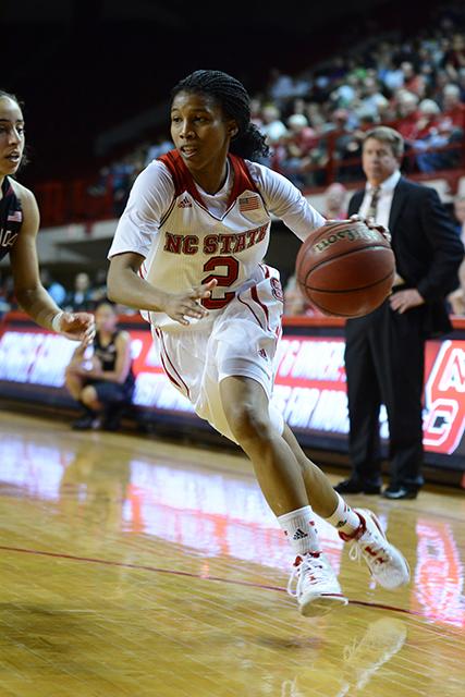 Red shirt junior guard Len'Nique Brown drives the ball towards the basket against Florida State. Len'Nique made 3 baskets to help the Wolfpack beat the Semonoles 80-57 Thursday, Jan. 16, 2014 in Reynolds Coliseum. Photo by Joseph Phillips