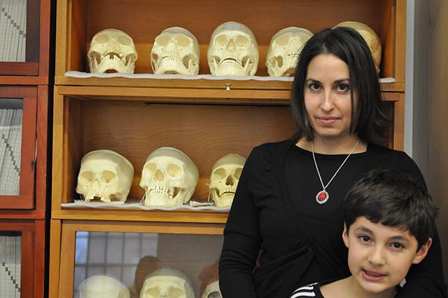 Ann Ross, a professor of anthropology, is working with a team of forensic anthropologists to develop a database of 3D CT scan images of skulls with a program they developed called 3D-ID. The database will allow forensic scientists to determine the sex and ancestry of unidentified skull remains. Photo by Elizabeth Davis