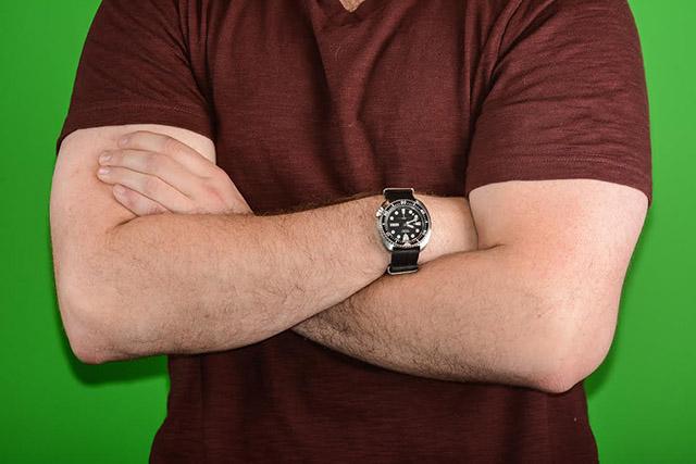 Dan Hall poses with his analog watch.