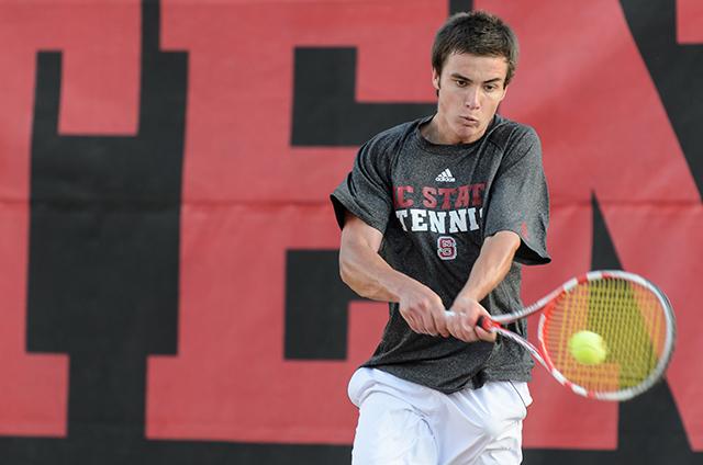 Junior Austin Powell hits a backhand during the men's tennis match against Virginia Tech Friday, April 5, 2013. Photo by John Joyner.