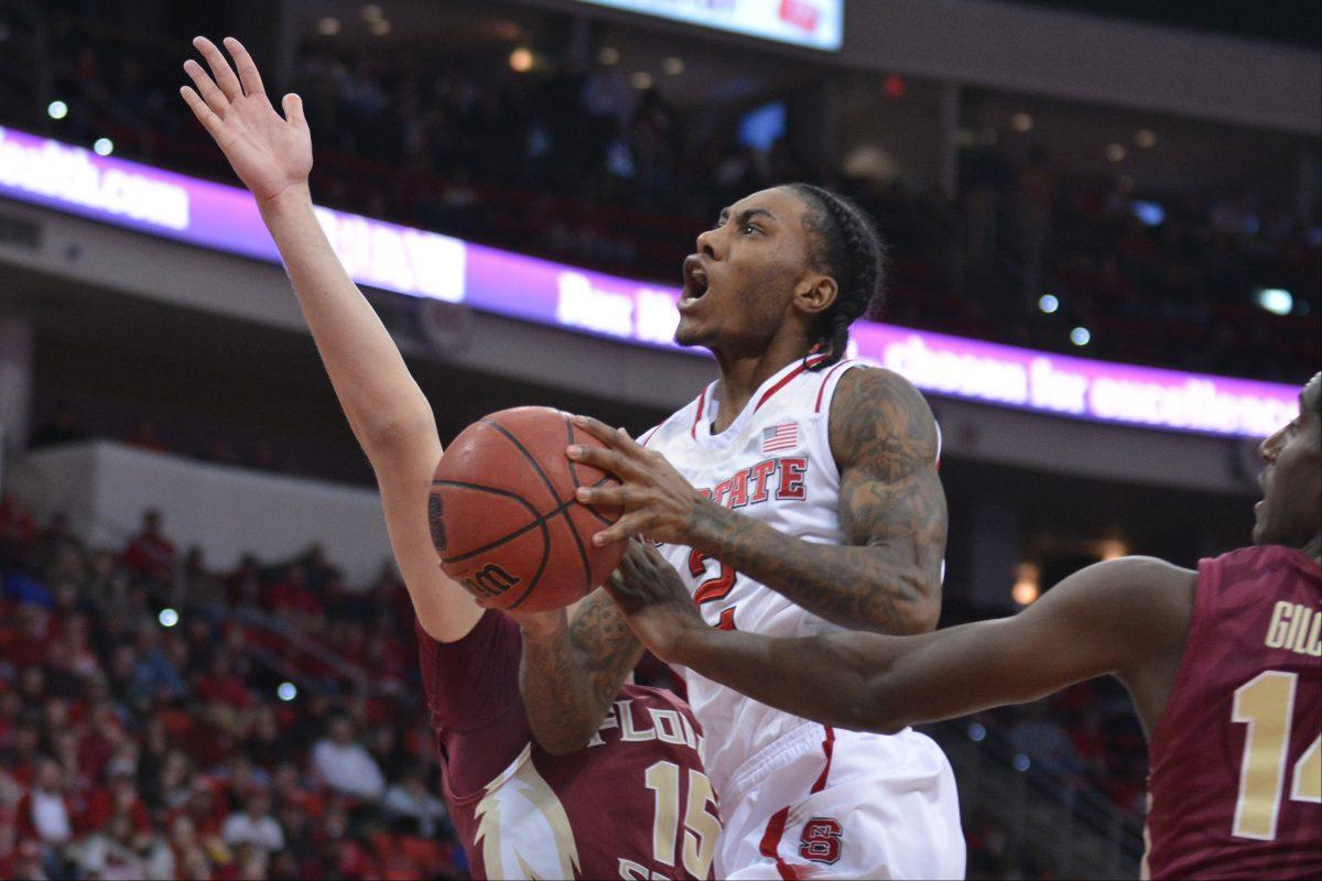 Freshman guard Anthony &#8220;Cat&#8221; Barber fights through traffic during the game against Florida State in PNC Arena on Wednesday. The Wolfpack defeated the Seminoles, 74-70.&#160;