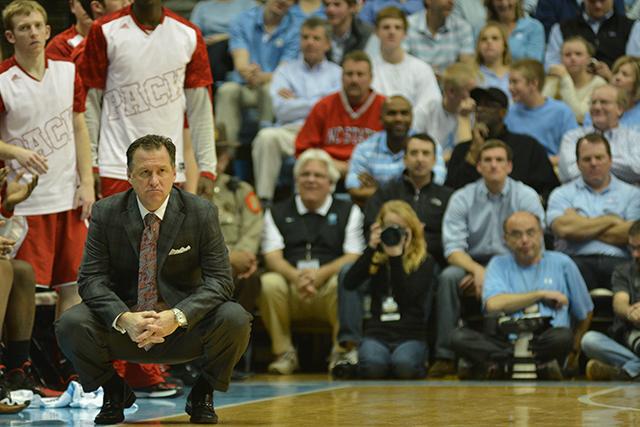 Head coach Mark Gottfried observes play against UNC-Chapel Hill on Saturday at the Dean Smith Center in Chapel Hill. The Wolfpack fell to the Tar Heels, 84-70, after the State failed to recover from a 17-point deficit at the end of the first half.&#160;
