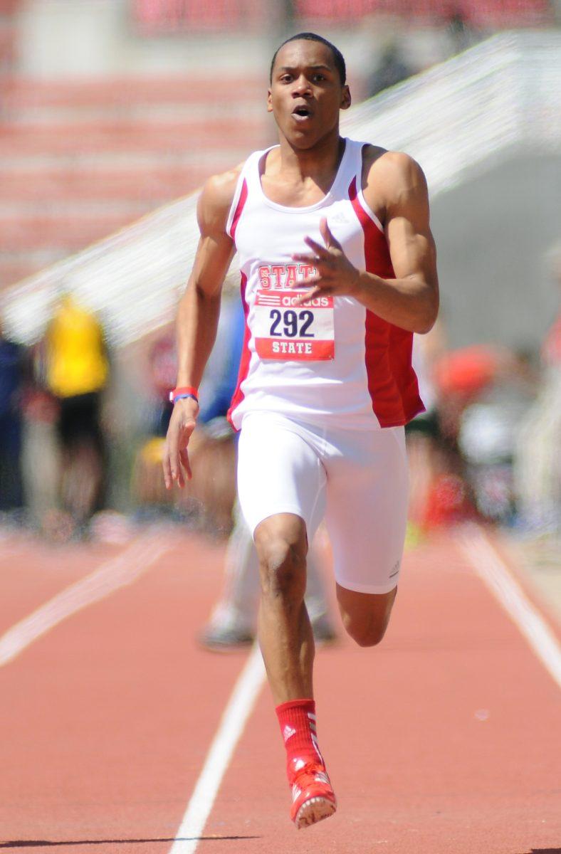 Freshman Jonathan Addison sprints toward the finish line during the men&#8217;s 100-meter race at the Raleigh Relays March 29. Addison finished with a time of 10.74 seconds.