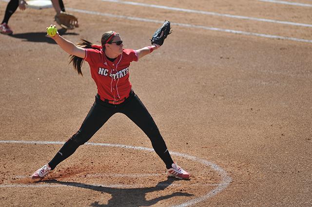 Sophomore pitcher Emily Weiman winds up for a pitch against North Carolina on April 13, 2013. Weiman pitched eight innings and had six strikeouts in the Wolfpack's 11-8 win against the Tar Heels at Dail Stadium.