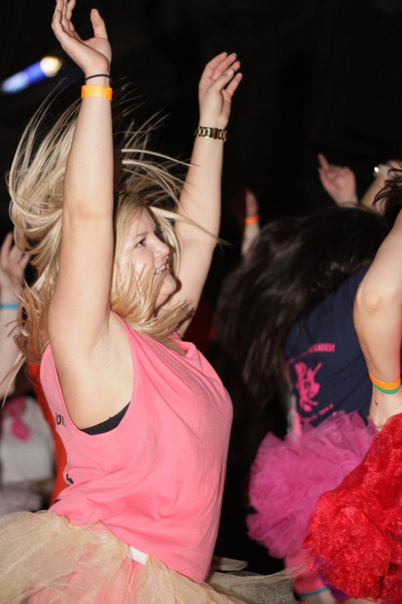 Carrie Althoff, a senior in business, dances at the N.C. State Dance Marathon fundraiser on Friday February 21in Carmichael Gym. The event consists students raising money for the Children's Mircle Network Hospitals by standing up for an entire night. Over $40,000 were raised at this year's event. Photo by Joannah Irvin.