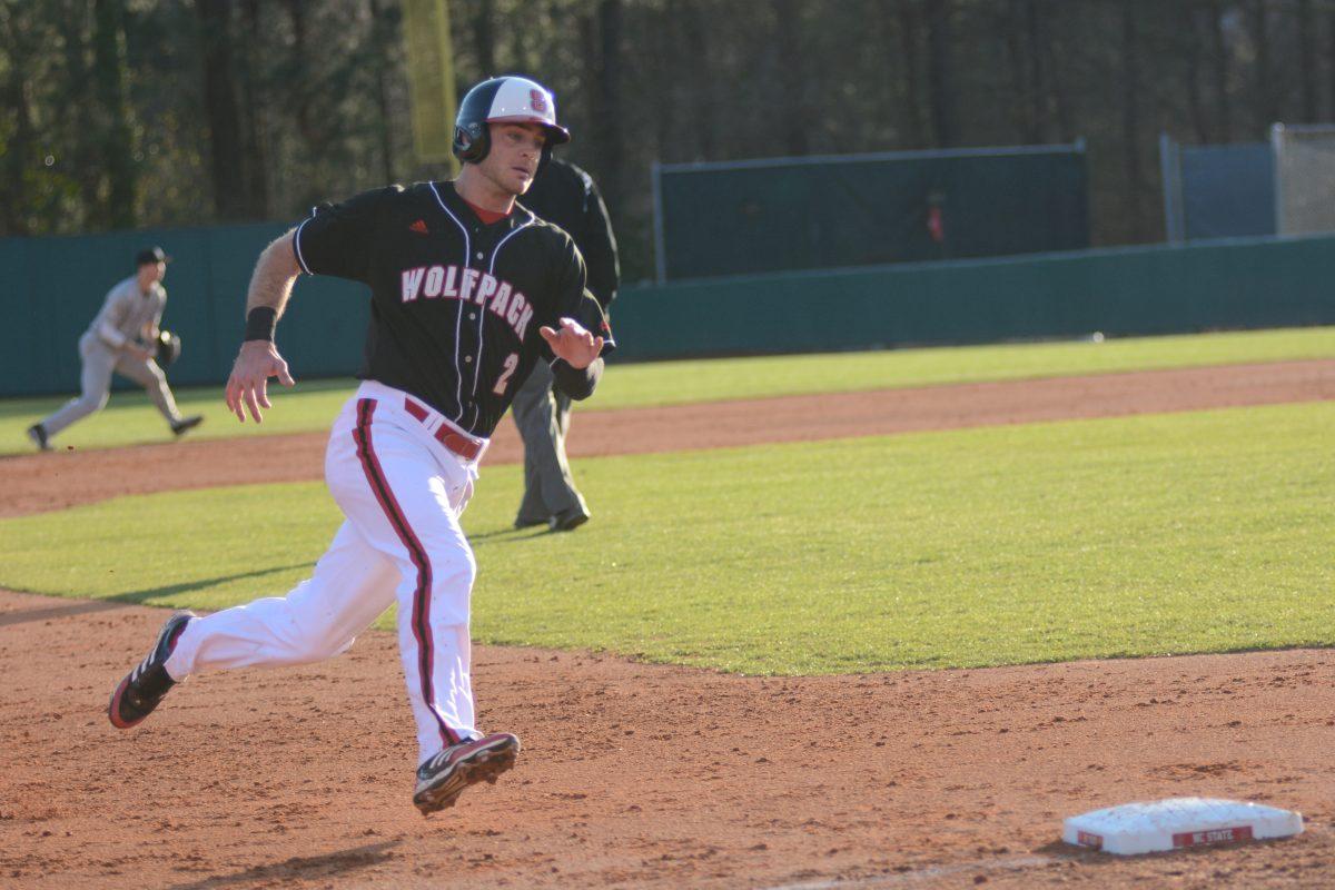 Junior outfielder Bubby Riley rounds third base during N.C. State&#8217;s matchup with Appalachain State Friday. Riley went two-for-four with two RBIs, helping the Wolfpack scrap out a 6-5 win over the Mountaineers.