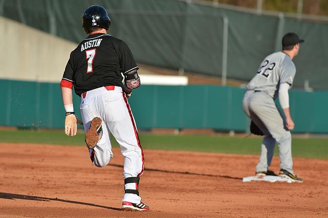 Junior outfielder Brett Austin sprints for second base during the first game of the Wolfpack's three-game series against Appalachian State at Doak Field Friday. Austin went one-for-two at the plate, scoring three runs and drawing two walks as the No. 6 Wolfpack defeated the Mountaineers, 6-5.