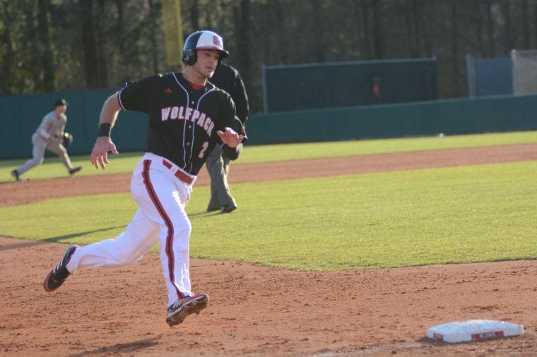 Junior outfielder Bubby Riley rounds third base during N.C. State&#8217;s matchup with Appalachain State Friday. Riley went two-for-four with two RBIs, helping the Wolfpack scrap out a 6-5 win over the Mountaineers.
