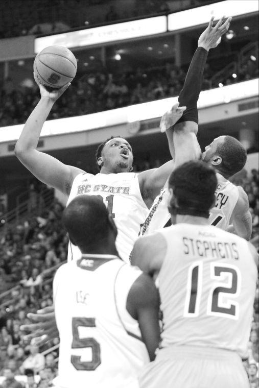 Forward freshman BeeJay Anya jumps to take a hook shot during the Wolfpack&#8217;s game against Georgia Tech in PNC Arena Jan. 26. The Wolfpack defeated the Yellow Jackets, 80&#8211;78, in overtime.&#160;