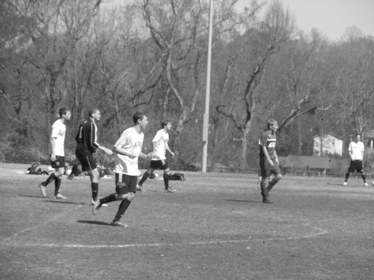 Senior Chris Jordan, senior Julian Deutsch, graduate student Corey Meisenheimer and senior Nich Thaxton move down the field during a game against Eastern Kentucky at a tournament in Clemson, S.C. in April 2013.
