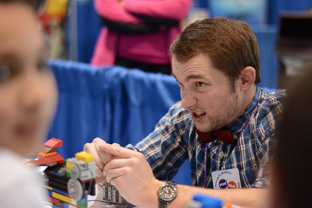 Families and children assembled Saturday at the Raleigh Convention Center at the LEGO KidsFest. The LEGO Fest featured a LEGO Model Museum of characters from fiction. Also featured was a brick pile for children to dive in and put bricks together. Two LEGO Master Builders, Steve Gerling and Chris Steininger, were present to teach tools of the trade that they have learned through their years of building with LEGOs. Gerling and Steininger built most of the models displayed in the Model Museum. As visitors exited the LEGO Fest, they had the opportunity to build a section of the United States and have it placed on a 65 feet long by 45 feet wide. Visitors could view this visitor-made model from a balcony.