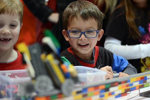 Families and children assembled Saturday at the Raleigh Convention Center at the LEGO KidsFest. The LEGO Fest featured a LEGO Model Museum of characters from fiction. Also featured was a brick pile for children to dive in and put bricks together. Two LEGO Master Builders, Steve Gerling and Chris Steininger, were present to teach tools of the trade that they have learned through their years of building with LEGOs. Gerling and Steininger built most of the models displayed in the Model Museum. As visitors exited the LEGO Fest, they had the opportunity to build a section of the United States and have it placed on a 65 feet long by 45 feet wide. Visitors could view this visitor-made model from a balcony.