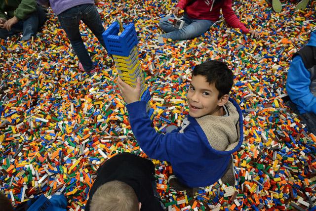 Families and children assembled Saturday at the Raleigh Convention Center at the LEGO KidsFest. The LEGO Fest featured a LEGO Model Museum of characters from fiction. Also featured was a brick pile for children to dive in and put bricks together. Two LEGO Master Builders, Steve Gerling and Chris Steininger, were present to teach tools of the trade that they have learned through their years of building with LEGOs. Gerling and Steininger built most of the models displayed in the Model Museum. As visitors exited the LEGO Fest, they had the opportunity to build a section of the United States and have it placed on a 65 feet long by 45 feet wide. Visitors could view this visitor-made model from a balcony.