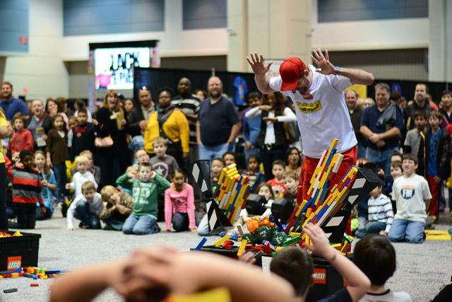 Families and children assembled Saturday at the Raleigh Convention Center at the LEGO KidsFest. The LEGO Fest featured a LEGO Model Museum of characters from fiction. Also featured was a brick pile for children to dive in and put bricks together. Two LEGO Master Builders, Steve Gerling and Chris Steininger, were present to teach tools of the trade that they have learned through their years of building with LEGOs. Gerling and Steininger built most of the models displayed in the Model Museum. As visitors exited the LEGO Fest, they had the opportunity to build a section of the United States and have it placed on a 65 feet long by 45 feet wide. Visitors could view this visitor-made model from a balcony.