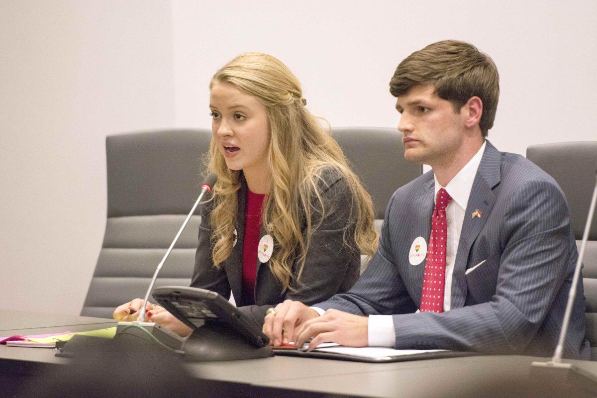 Student Body President candidates, Alanna Propst and Rusty Mau, debate issues of diversity to a crowd of fellow student body candidates, faculty members and students.&#160;