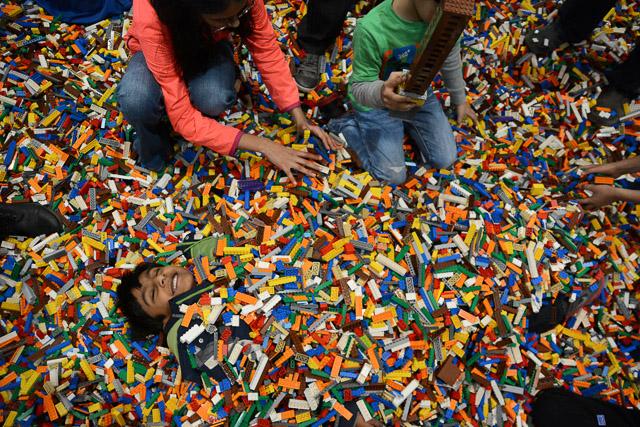 Families and children assembled Saturday at the Raleigh Convention Center at the LEGO KidsFest. The LEGO Fest featured a LEGO Model Museum of characters from fiction. Also featured was a brick pile for children to dive in and put bricks together. Two LEGO Master Builders, Steve Gerling and Chris Steininger, were present to teach tools of the trade that they have learned through their years of building with LEGOs. Gerling and Steininger built most of the models displayed in the Model Museum. As visitors exited the LEGO Fest, they had the opportunity to build a section of the United States and have it placed on a 65 feet long by 45 feet wide. Visitors could view this visitor-made model from a balcony.