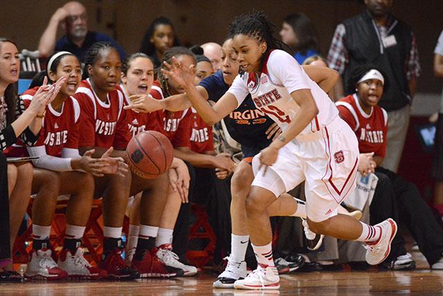 Junior guard Krystal Barrett chases a loose ball during the game against Virginia in Reynolds Coliseum Sunday, Feb. 23, 2013. Barrett had seven points, three assists, and four rebounds in the Wolfpack&#8217;s 68-66 victory over the Cavaliers. Photo by John Joyner.
