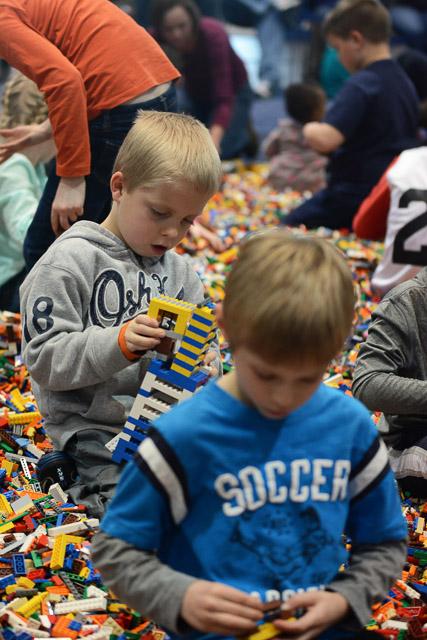 Families and children assembled Saturday at the Raleigh Convention Center at the LEGO KidsFest. The LEGO Fest featured a LEGO Model Museum of characters from fiction. Also featured was a brick pile for children to dive in and put bricks together. Two LEGO Master Builders, Steve Gerling and Chris Steininger, were present to teach tools of the trade that they have learned through their years of building with LEGOs. Gerling and Steininger built most of the models displayed in the Model Museum. As visitors exited the LEGO Fest, they had the opportunity to build a section of the United States and have it placed on a 65 feet long by 45 feet wide. Visitors could view this visitor-made model from a balcony.